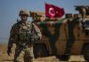 US-Israel Predictably Behind Turkish Aggression in Syria/ By Tony Cartalucci Global Research, March 11, 2020 A U.S. soldier stands guard with a Turkish flag in the background.