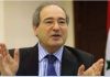 Syria’s Deputy Minister of Foreign Affairs and Expatriates Faisal al-Miqdad on UN Security Council’s approval of a resolution on extending ,for one year, cross-border “aid” to Syria through the Bab al-Hawa border crossing: Man speaking, wearing a suit and tie indoors.