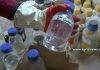 SAA Discovers ISIS’s Chemical Workshop in Eastern Homs/ By Arabi Souri, October 18, 2017 Scientist holding a labeled liquid container in a lab.
