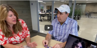 PCR Lab Visit: Whistleblowers Kevin McKernan, Bobby Malhotra Explain Why COVID Tests are “Garbage”/ Daily clout Two people discuss something at a table in an office setting.