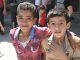 Sanctions on Syria – a silent death and killing hope/ By Vanessa Beeley Two boys smiling and posing for the camera outdoors.