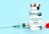 13,000 Deaths, Nearly 600,000 Adverse Events Reported after COVID Vaccines, as Debate Heats Up Over Boosters A vial labeled COVID-19 vaccine and a syringe on a blue background.