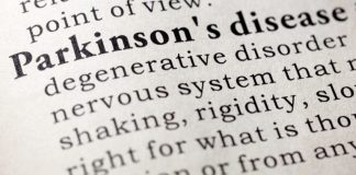 Scientist Sounds Alarm: COVID Vaccines Producing Symptoms of Parkinson’s, Other Neurodegenerative Disorders Close-up of a dictionary page showing the word Parkinson's disease.