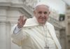Argentina ‘Dirty War’ Accusations Haunt Pope Francis/ By Vladimir Hernandez Pope Francis waving and smiling outdoors.
