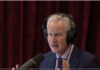 “The virus is not spread asymptomatically”/ By Dr. Peter McCullough A man speaking into a microphone wearing headphones in a recording studio.