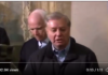 Lindsey Graham and John McCain in Ukraine in December 2016/ By The Line Canada Two men in a formal setting, one speaking.