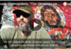 Donbass Commanders: “The Ukrainian People are our Friends, our Relatives … ” / Interview by Eva Bartlett A man in sunglasses speaks with a religious icon backdrop.