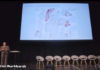 Dr Arne Burkhardt Confirms Sperm Has Been Almost Entirely Replaced By Spike Proteins A person presenting a scientific slide on the expression of a gene in adult mouse tissues.