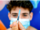 Problematic Lots and Batches Person holding a syringe with a blurred face in the background.