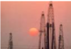 Wars of Religion: The “Demonization” of Muslims and the Battle for Oil/ By Prof Chossudovsky Sunset behind a silhouette of oil drilling rigs.