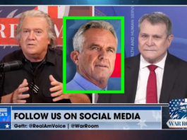 Three men in a news studio with social media text overlay.