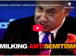 A man speaking seriously about antisemitism on a televised show.