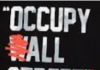 Video: Who’s Funding the Protest Movement? Who’s Behind it? It’s Called “Manufactured Dissent”/By Prof Michel Chossudovsky Black graphic saying OCCUPY ALL STREETS