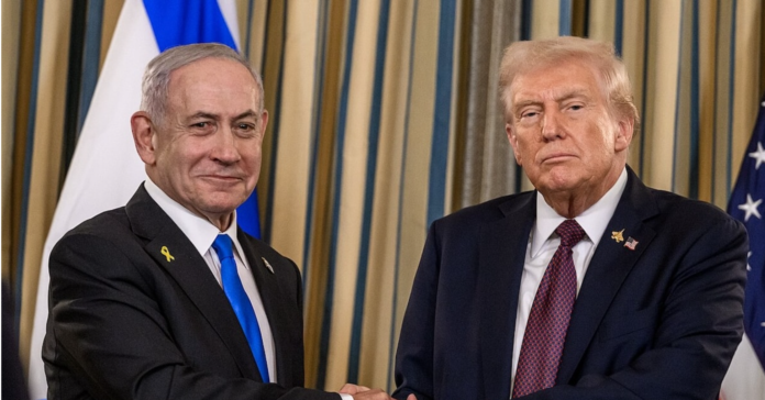 Two men in suits shaking hands