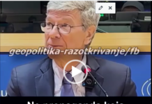 Ukraine Timeline/ Jeffrey Sachs Older man speaking at conference podium